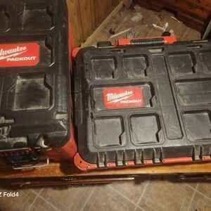 Milwaukee tool boxes times 2 impact plus some sort f saw I forget brand new